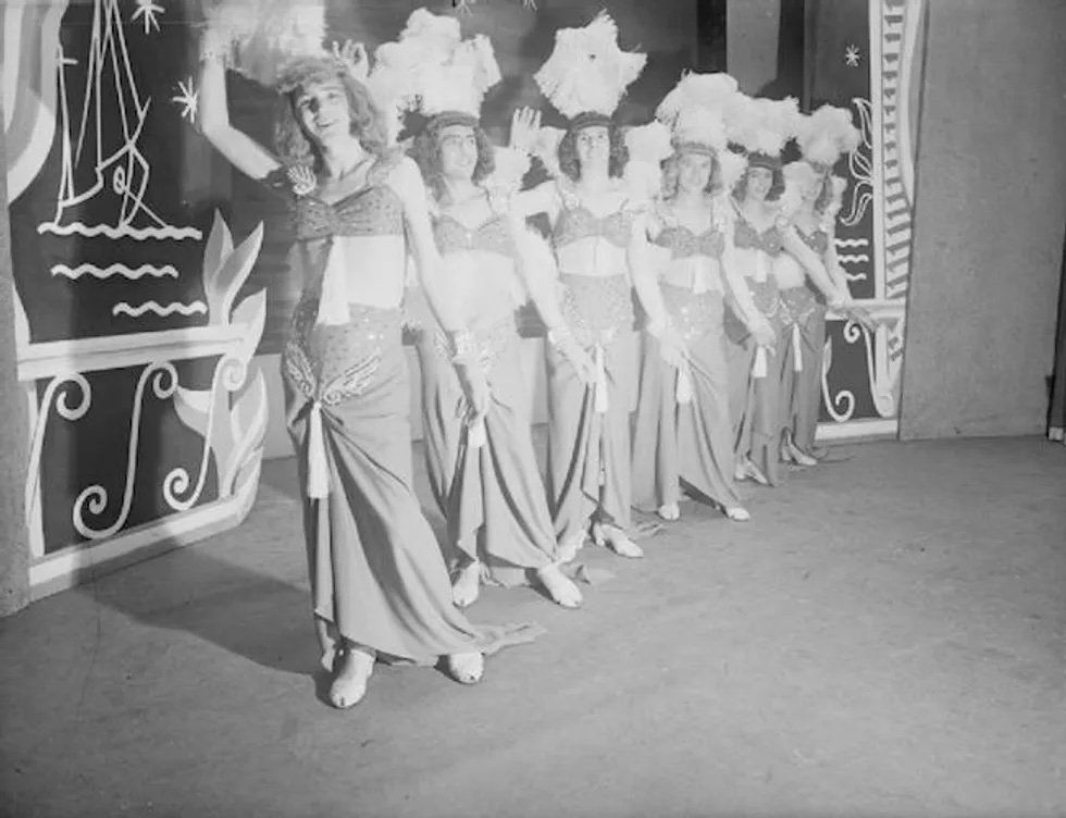 14) Six female impersonators perform \u2018Pacific Show Boat.\u2019