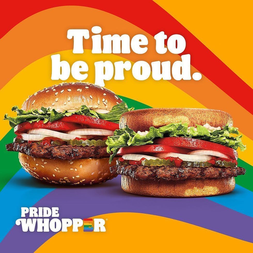 A burger King ad stating that it's "Time to be proud" over a wavy rainbow background and two Pride Whoppers. On the left, a Top Whopper with a top bun serving as both top and bottom of the burger, and the Bottom Whopper, the same but with bottom buns.