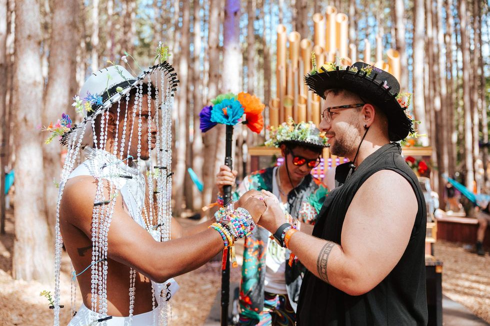 A gay couple at Electric Forest.