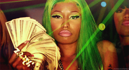 A GIF of Nicki Minaj with money. 