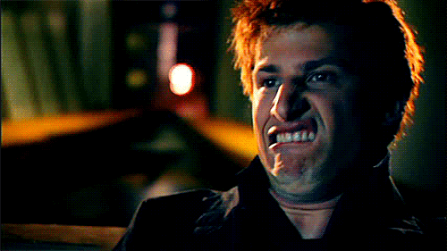 A GIF of someone making an ugly face.