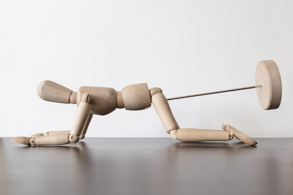 a wooden toy enjoying sex