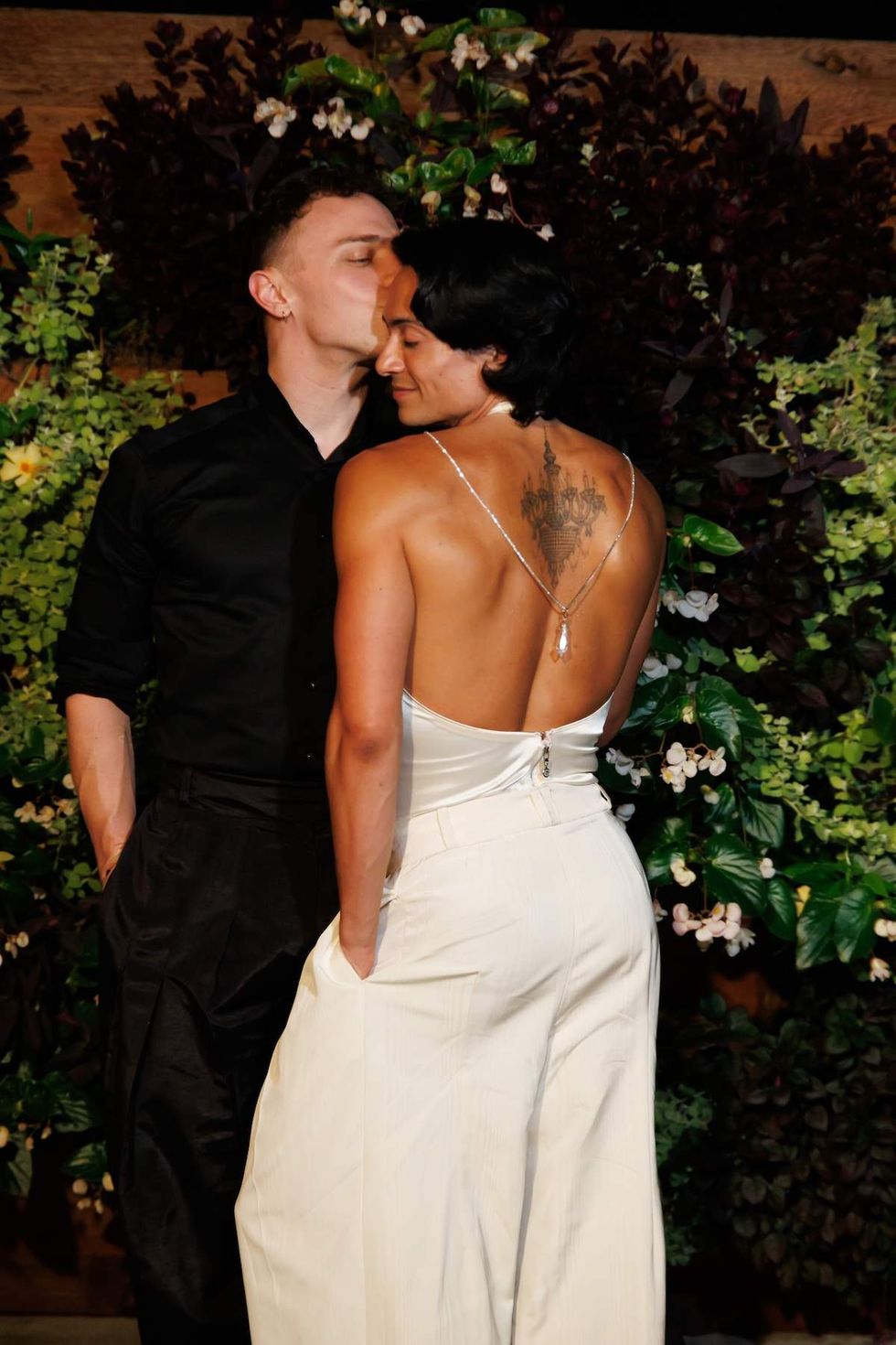 Alexander Montgomery, left, and Cordero Zuckerman posed for a photo following their wedding.