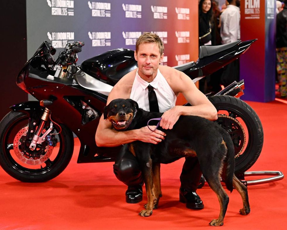 Alexander Skarsg\u00e5rd and Maggie the dog