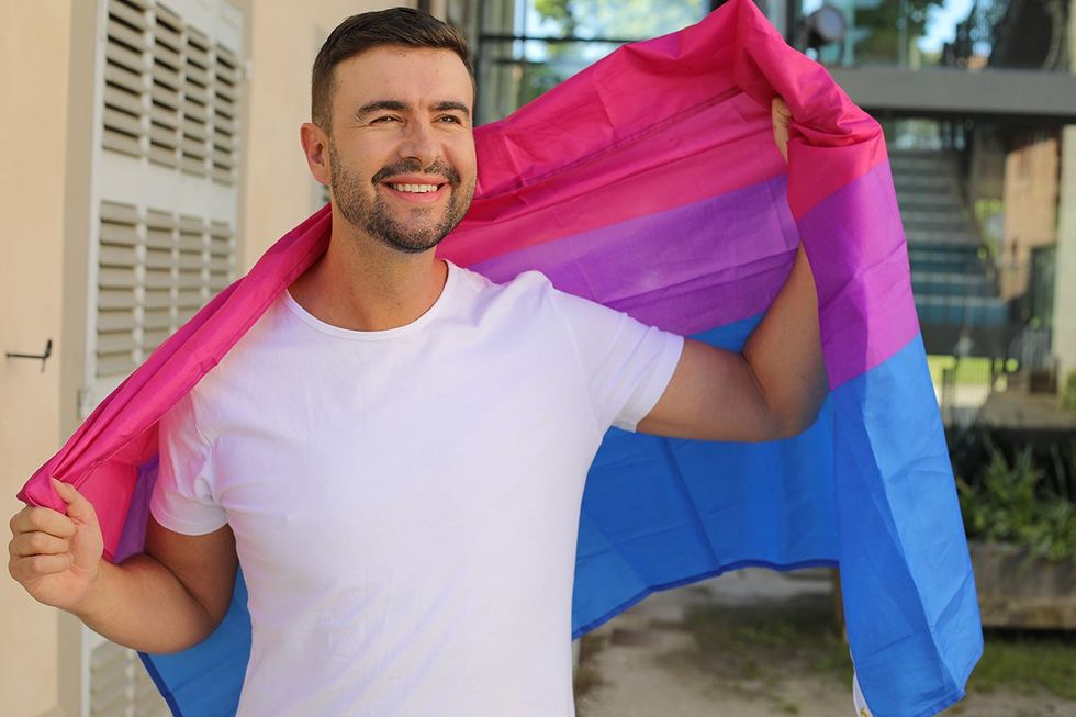 bisexual man with a flag