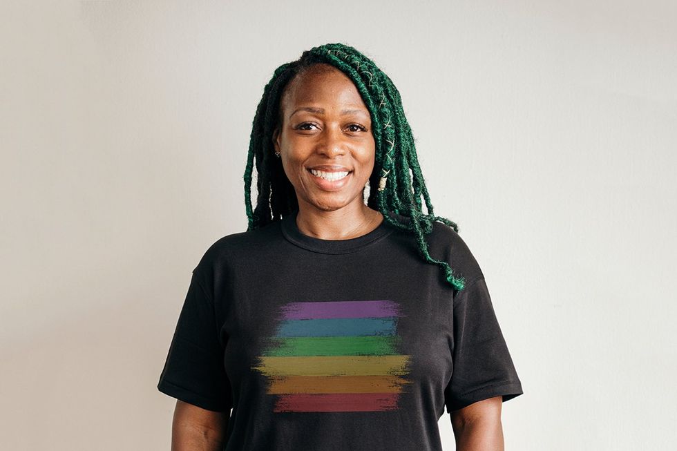 black woman with a Pride rainbow shirt