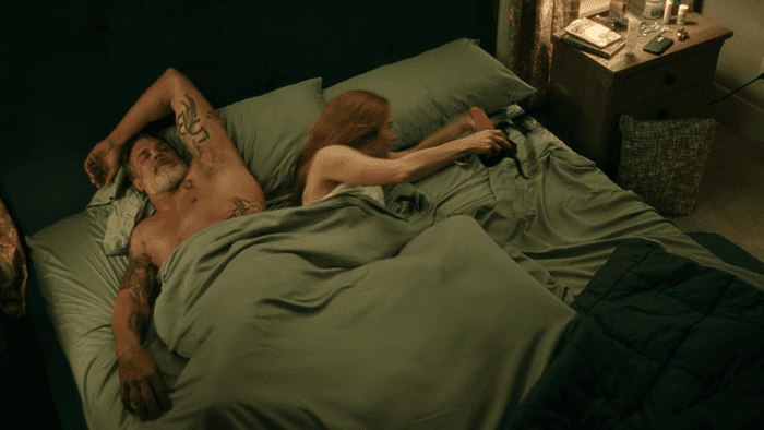 Branton Box as Sheriff Jonny and Jaime Ray Newman as Callie on The Hunting Wives