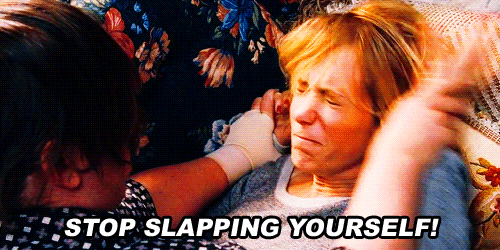 Bridesmaids stop hitting yourself gif
