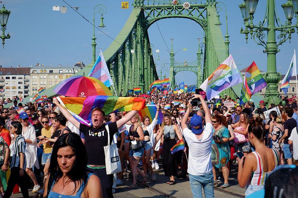 Budapest, Hungary - 24, July, 2021: people celebrate the Budapest Pride March demands for better rights and equality at the Freedom bridge. Budapest Pride is a series of LGBTQ events in Budapest