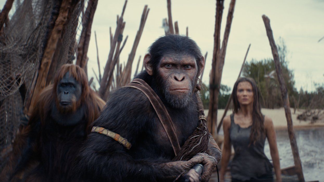 Caption (L-R): Raka (played by Peter Macon), Noa (played by Owen Teague) , and Freya Allan as Nova in 20th Century Studios' KINGDOM OF THE PLANET OF THE APES