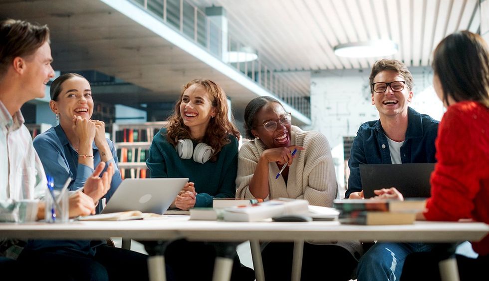 cheerful lgbtqia college students library discussions PRIDE SITE photo gallery list banned books lgbtq titles