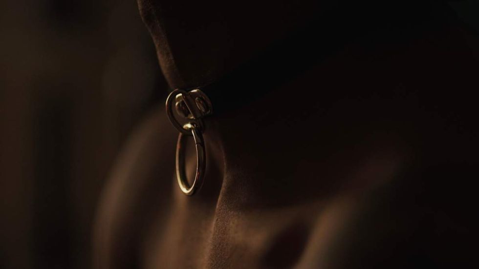 close up of a woman's neck in a collar