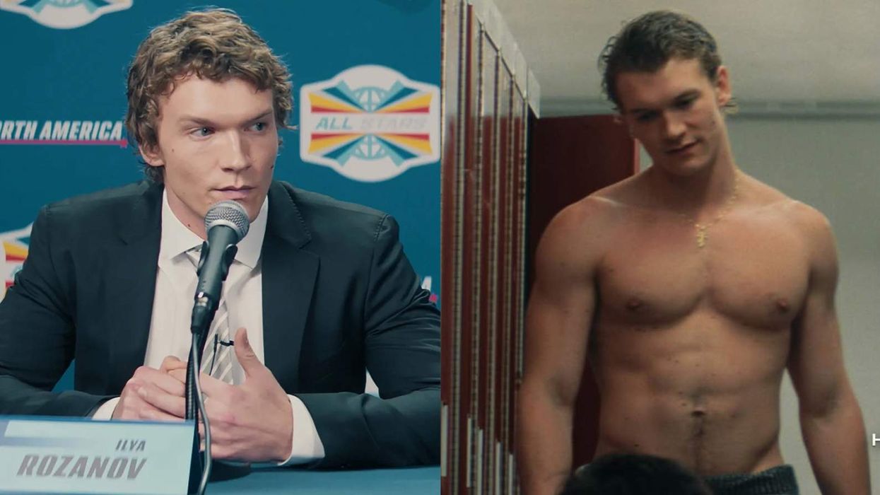 Connor Storrie as Ilya Rozanov in a suit and in just a towel