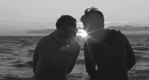 Couple kiss on beach gif