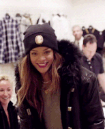 Cute gif of Rihanna smiling and laughing.