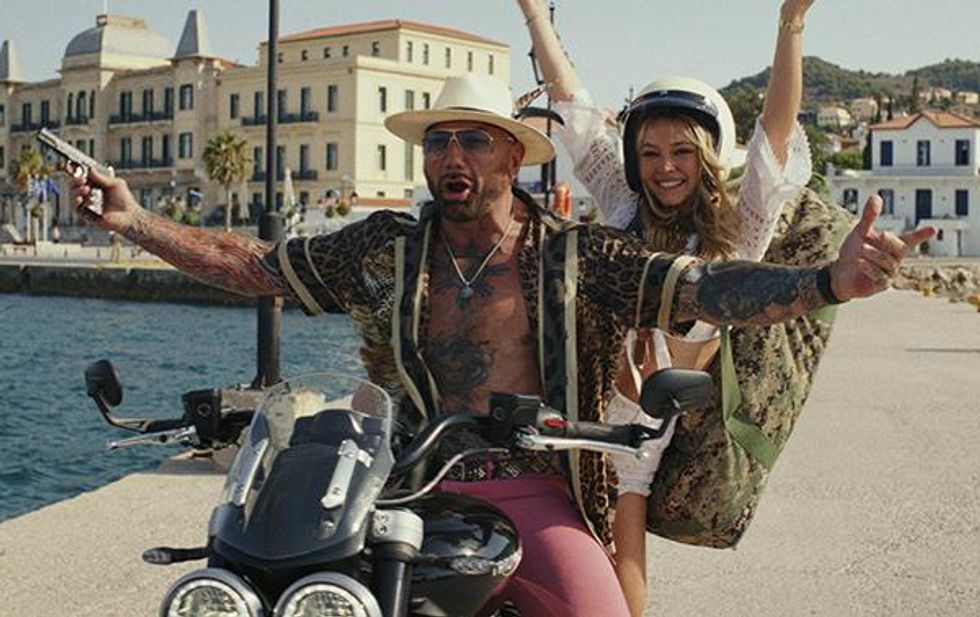 Dave Bautista & Madelyn Cline in Glass Onion: A Knives Out Story