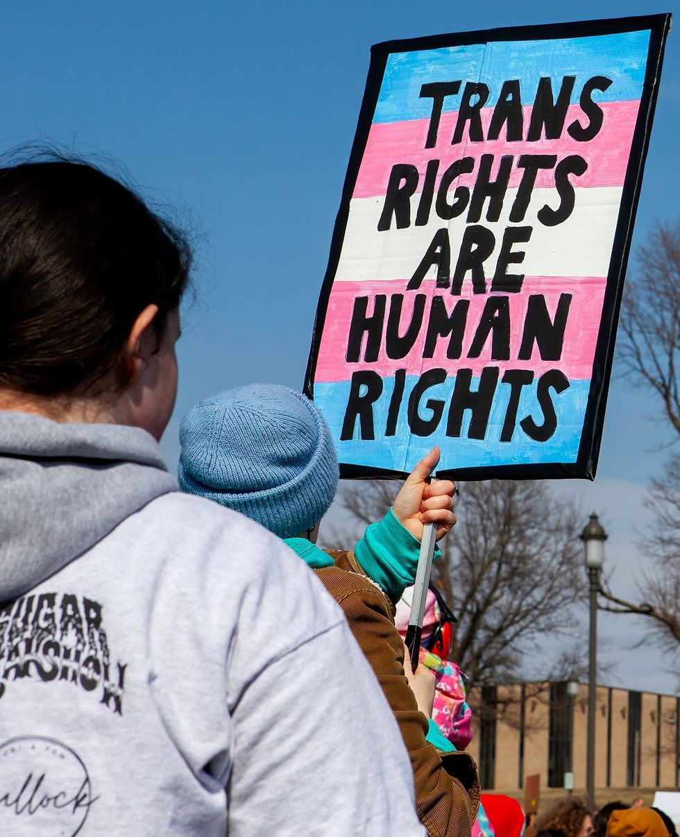 Des Moines Iowa transgender march sign trans rights are human rights