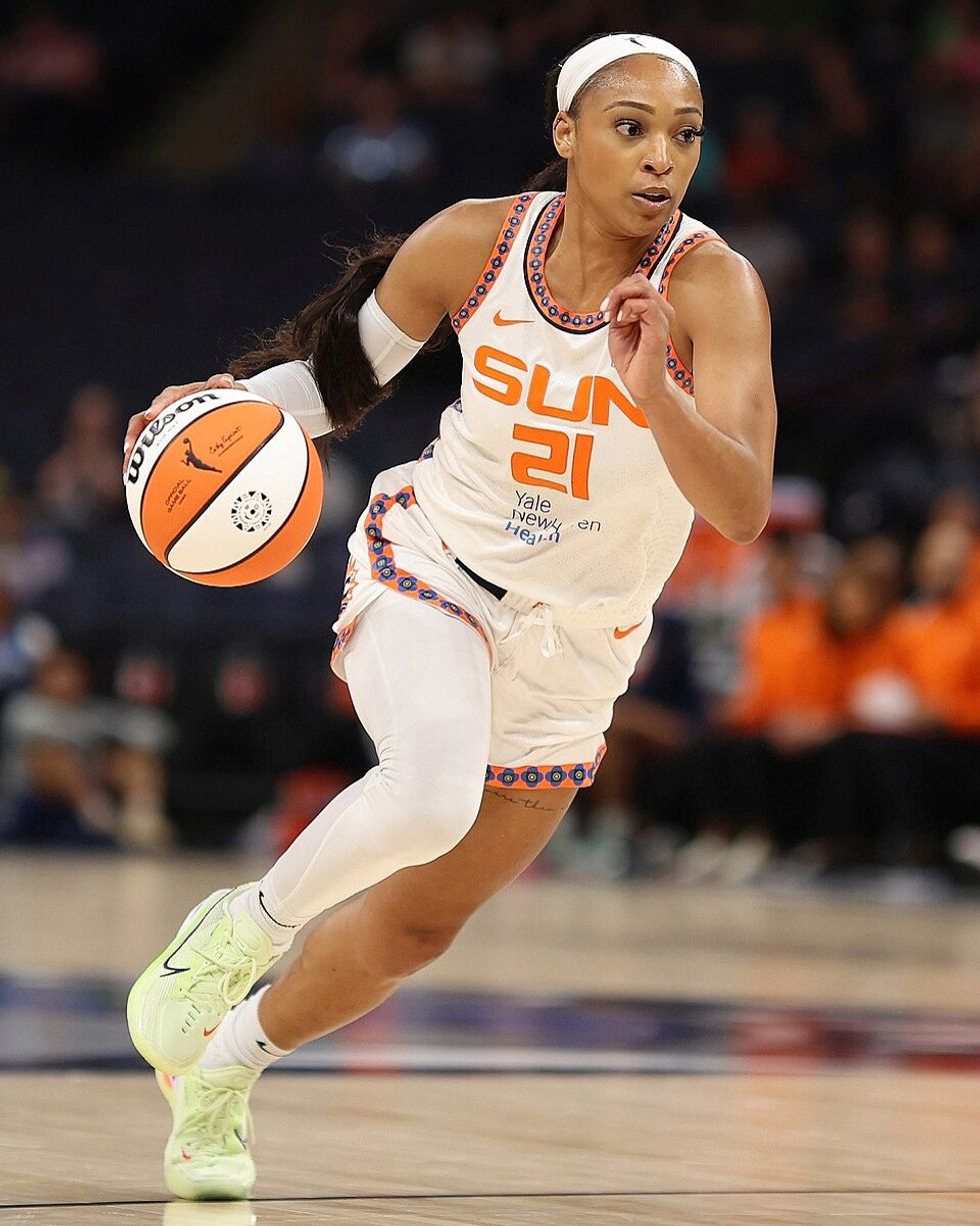 DiJonai Carrington photo gallery queer women 2025 WNBA womens professional basketball league