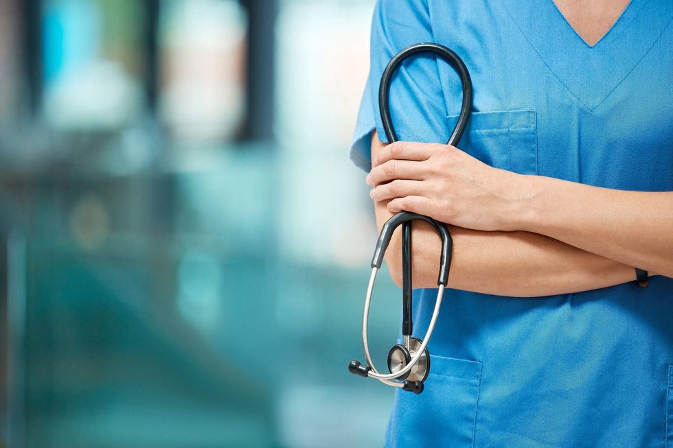 Doctor holding a stethoscope.