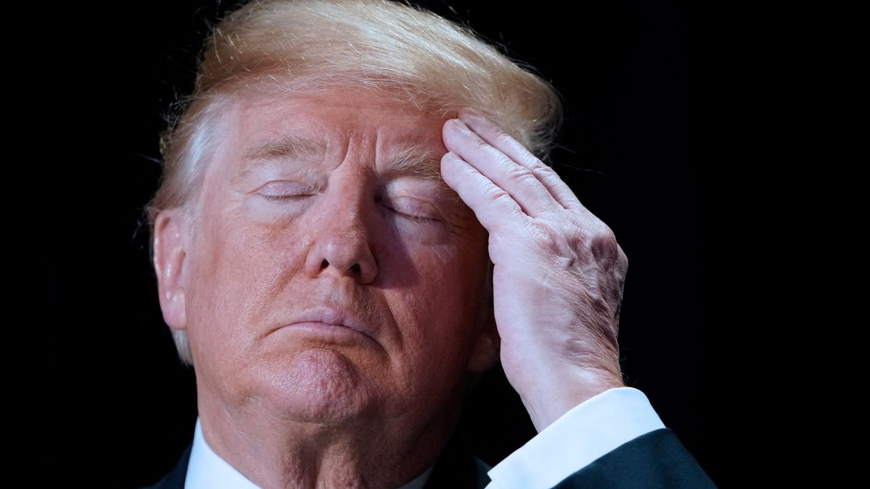 Donald Trump with his eyes closed