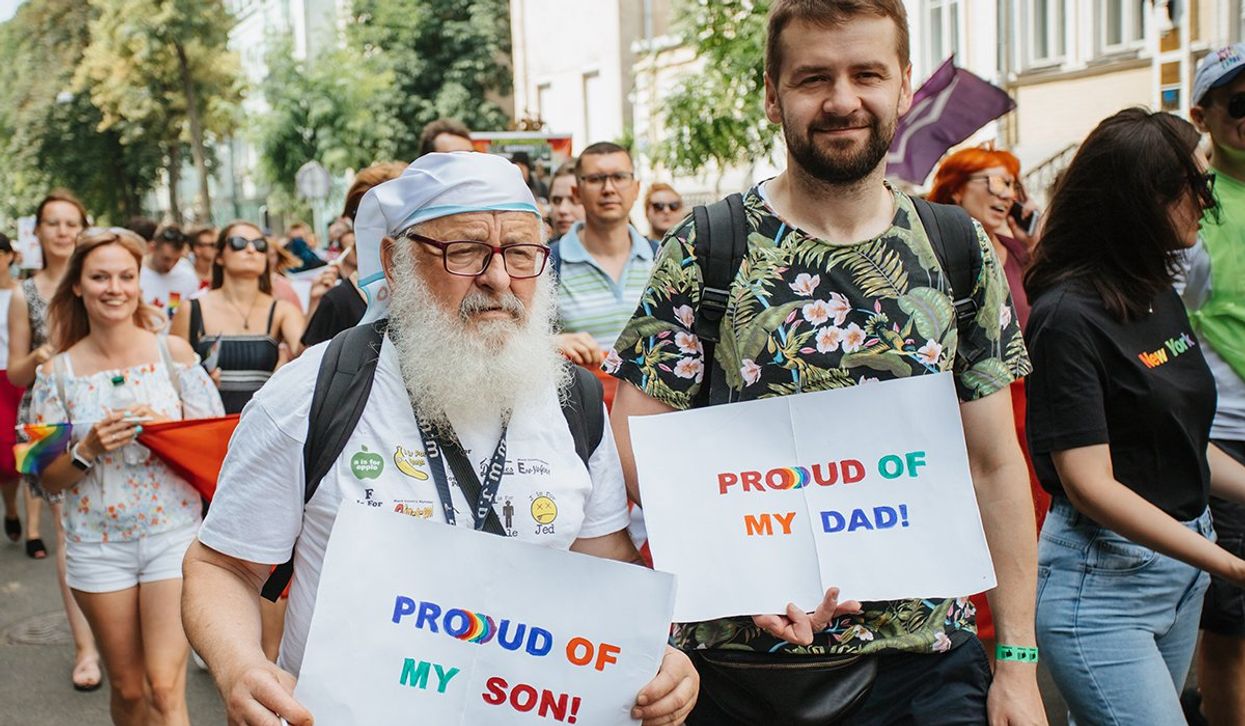 Father and son at gay pride
