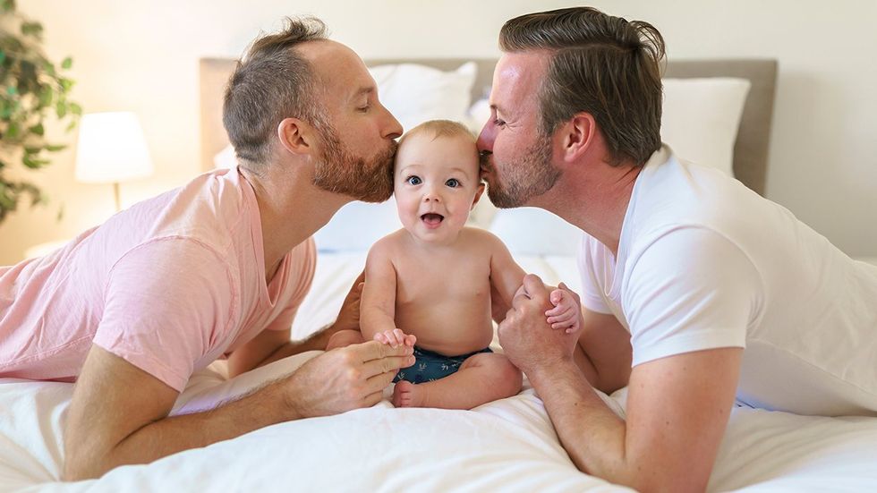 Gay dads with baby 