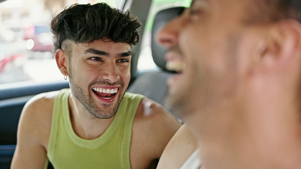 gay men laughing