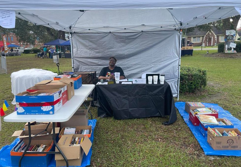 Georgia Pierce County librarian LaVonnia Moore hosting an outdoor book sale for the library