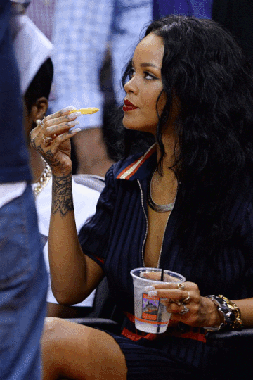 Gif of Rihanna eating fries.
