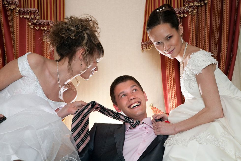groom with two brides