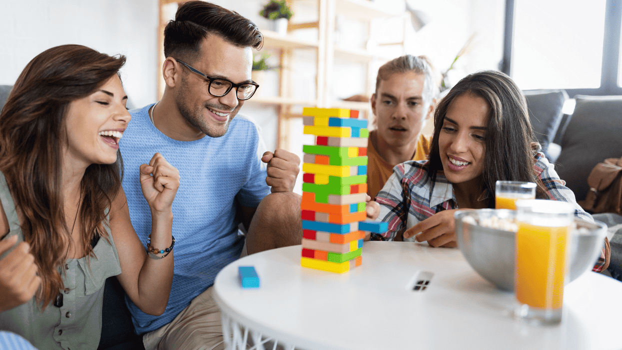 group of people playing game relationship therapy advice opinion pride queer polycule