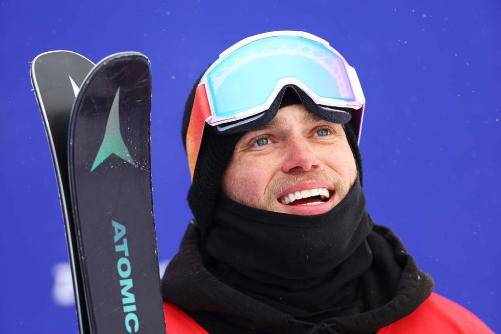 Gus Kenworthy of Team Great Britain reacts after their second run during the Men's Freestyle Skiing Freeski Halfpipe Qualification on Day 13 of the Beijing 2022 Winter Olympics