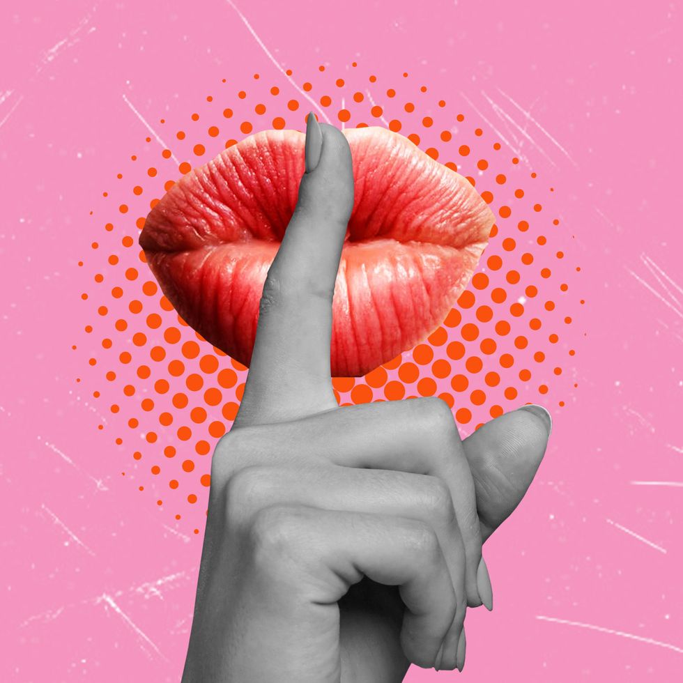 Hand making the quiet sign over the top of red lips