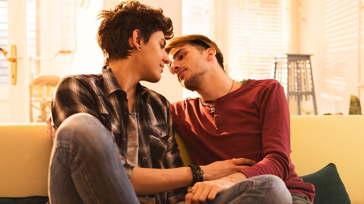 how to hook up: gay couple kiss on couch