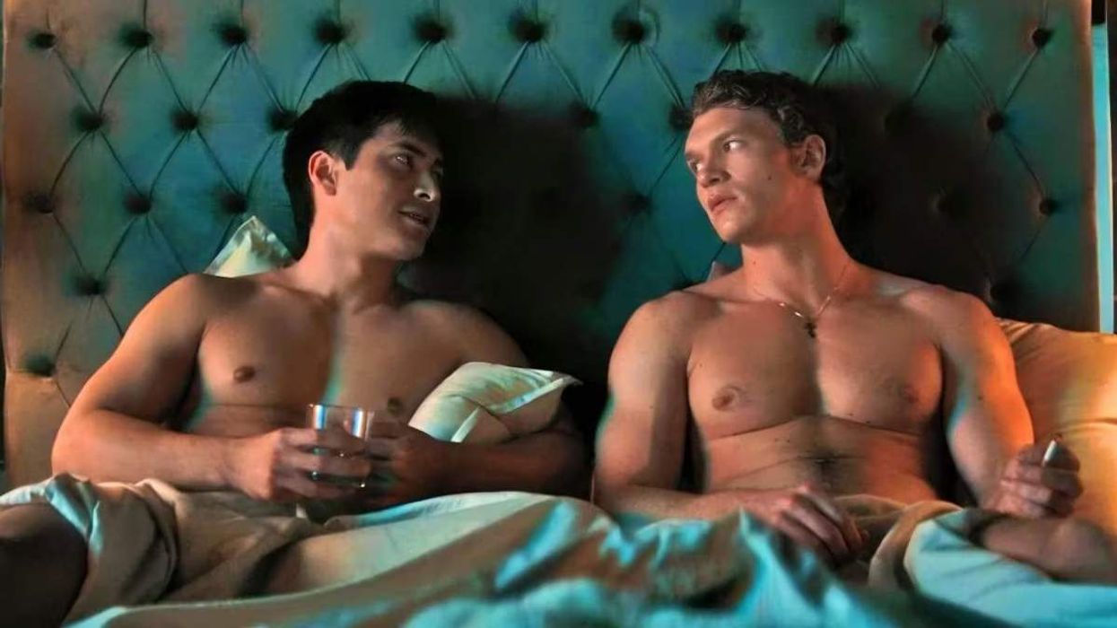 Hudson Williams as Shane Hollander and Connor Storrie as Ilya Rozanov in Heated Rivarly sitting in bed