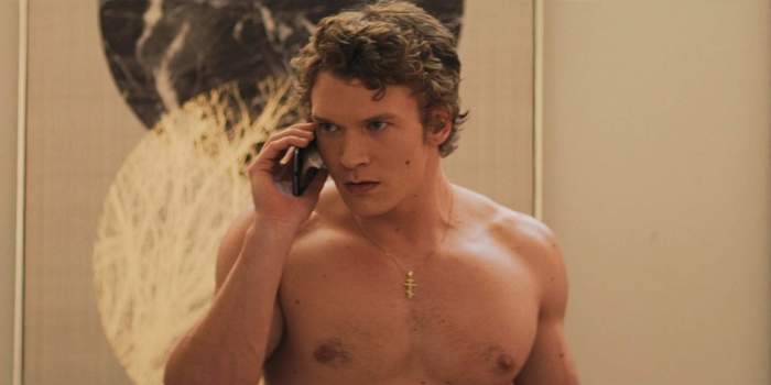 Ilya on the phone with his dad in 'Heated Rivalry.'\u200b