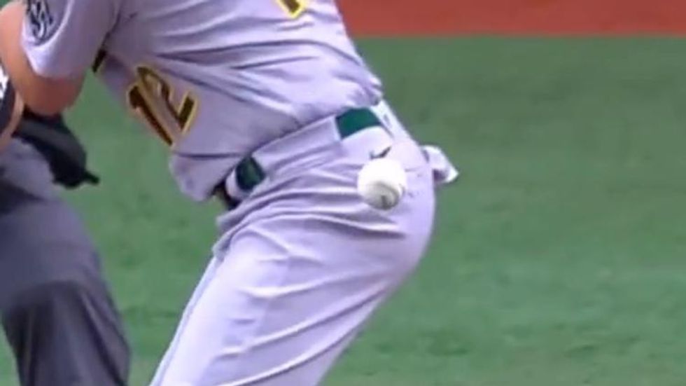 Baseball Player's Butt Bops Ball to Save the Pitch in Viral Clip