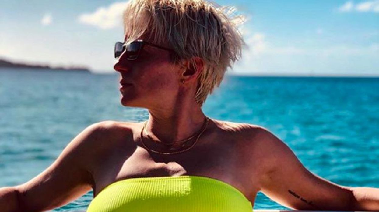 <p>Megan Rapinoe Is First Openly Gay <em>Sports Illustrated</em> Swimsuit Model</p>