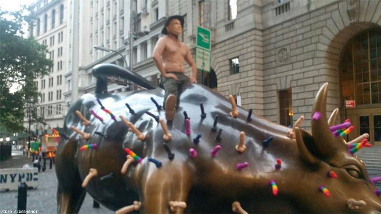 <p>A Shirtless Vladimir Putin Rode the Wall Street Bull Covered in Rainbow Dildos</p>
