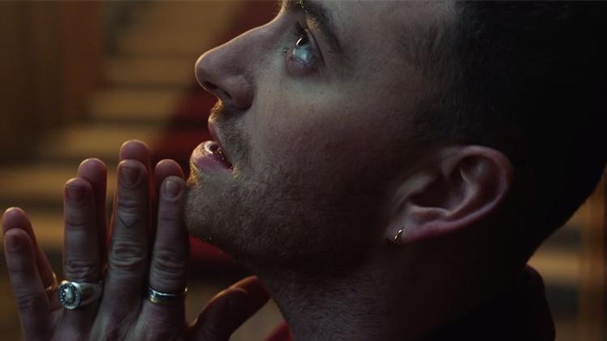 <p>Sam Smith & Logic Reckon with Their Privilege in 'Pray' Music Video</p>