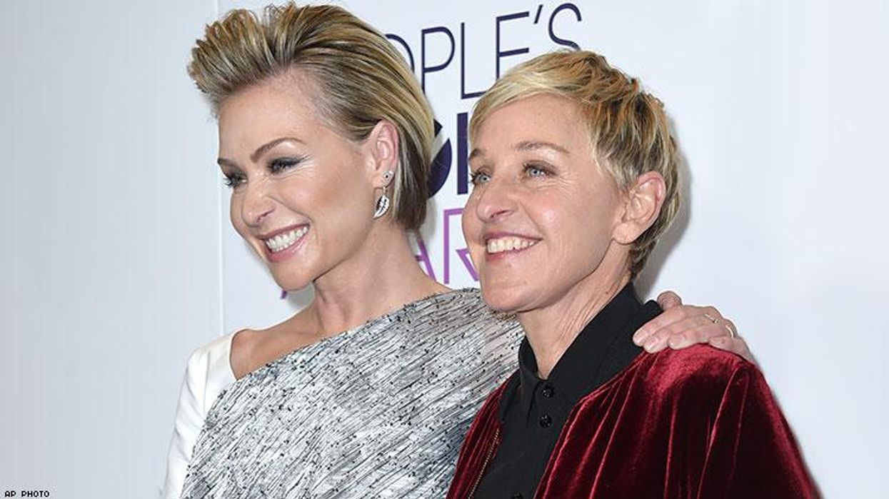<p>Ellen DeGeneres & Portia De Rossi Share a Birthday Kiss!</p>
