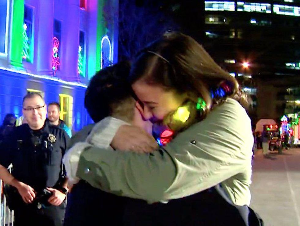 WATCH: Denver Police Officer Surprises Girlfriend With Adorable Holiday Proposal  
