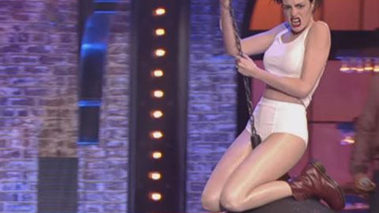 <p>WATCH: Anne Hathaway Rides Miley's Wrecking Ball While Flipping Off Emily Blunt</p>