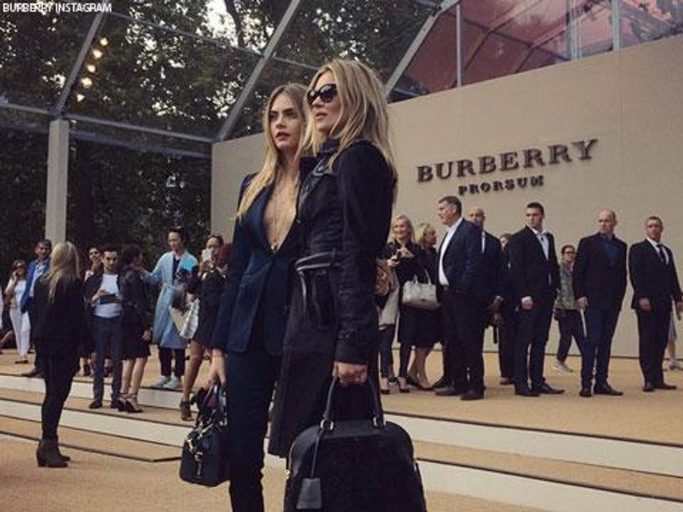 Cara Delevingne Wears Menswear to Burberry 15' Fashion Show, Has a blast 