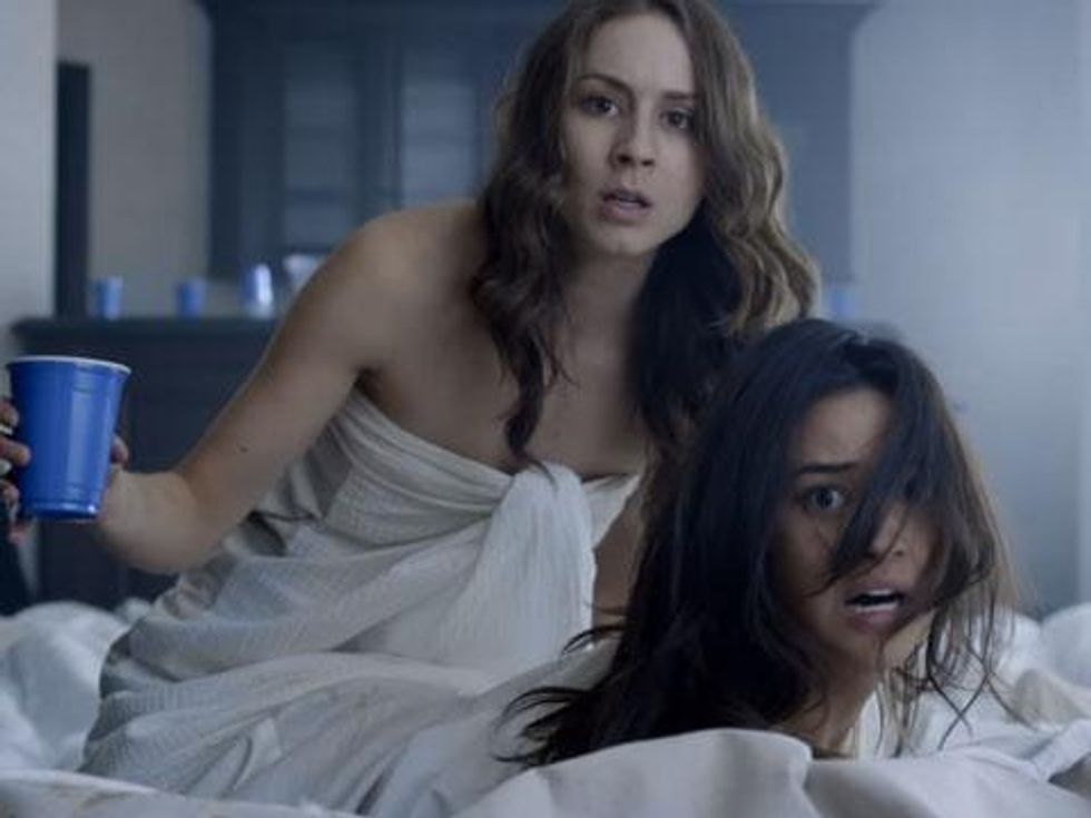 WATCH: Pretty Little Liars' Shay Mitchell and Troian Bellisario Don Bedsheets and Argue Dogma in 'Immediately Afterlife' 