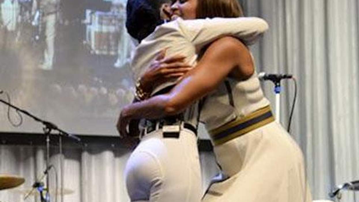 <p>Colliding of the Fashion Gods: Michelle Obama and Janelle Monáe Hug it Out At Club Nokia</p>