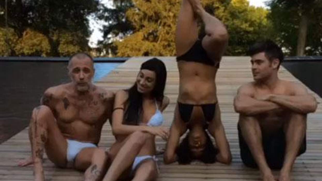 <p>Michelle Rodriguez Strikes a Pose - On Her Head</p>