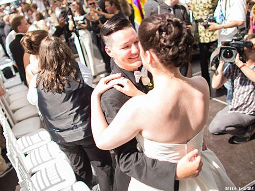 PHOTOS: Tons of Couples Flock To World Pride For Mass Wedding!