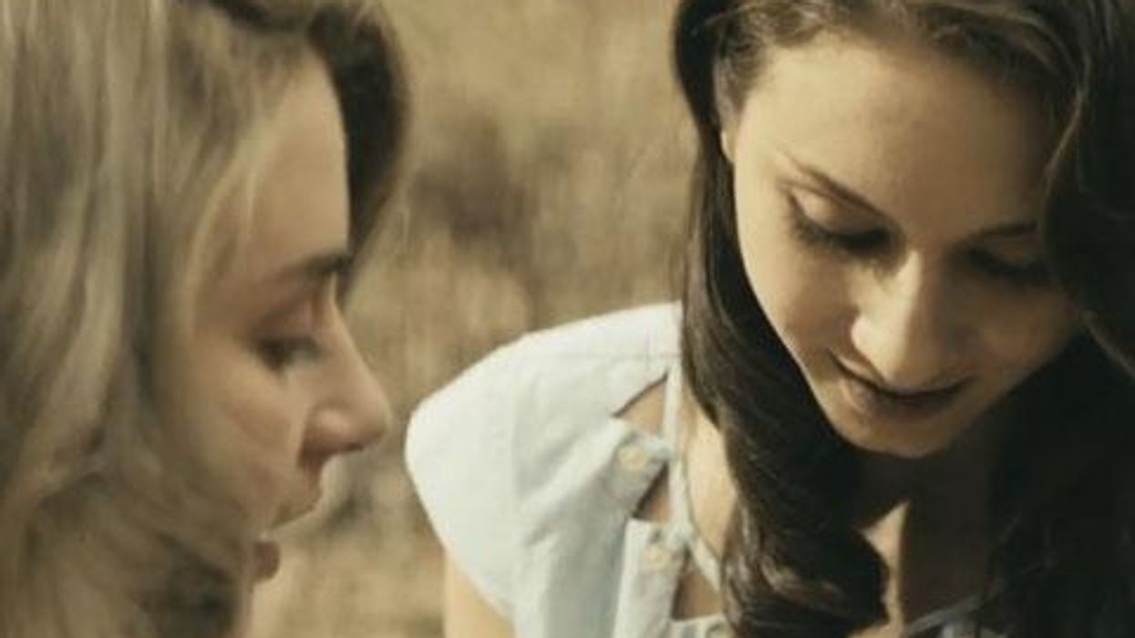 <p>WATCH: <em>Pretty Little Liars' </em>Troian Bellisario Stars in New Video Depicting Lesbian Love</p>