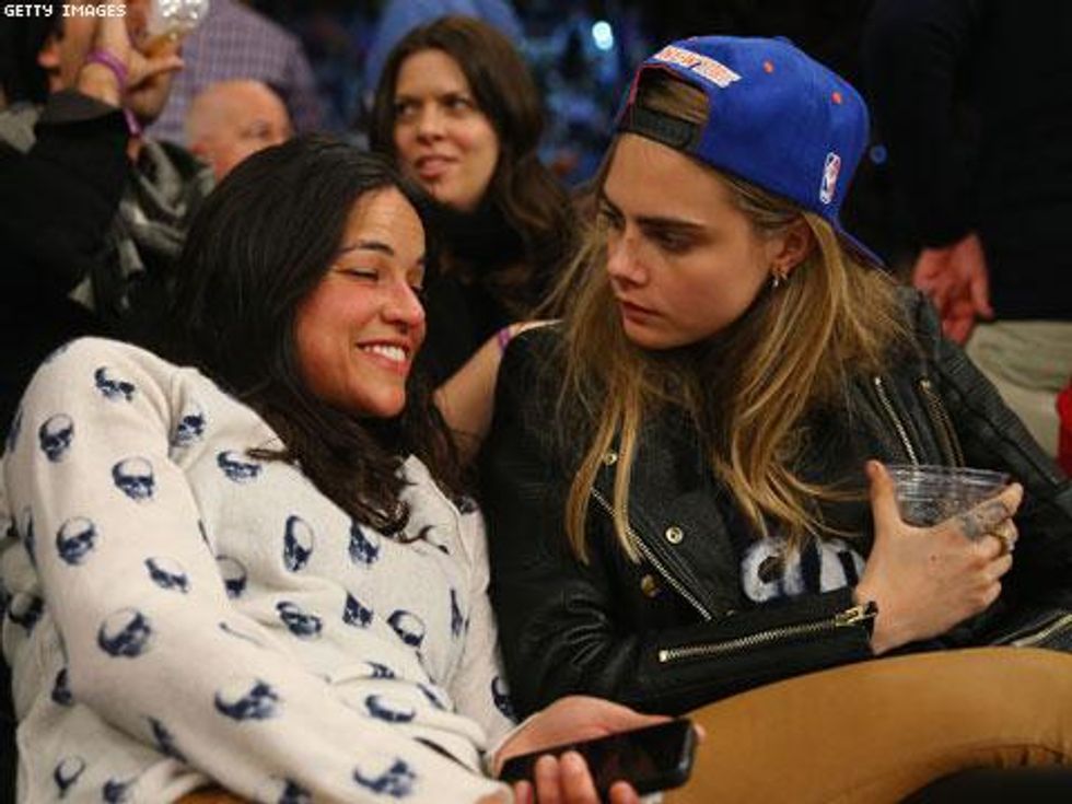 Michelle Rodriguez and Victoria's Secret Model Cara Delevingne Engage in Major PDA at Knicks Game 